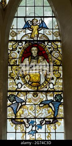 A memorial stained glass window in St. Peter`s Church, Stonnall, Staffordshire, England, UK Stock Photo